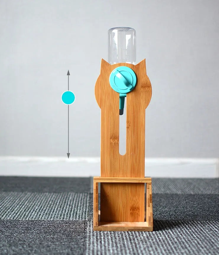 Cat drinking water dispenser with bamboo wood holder and 300ml water container in grey, green, and pink