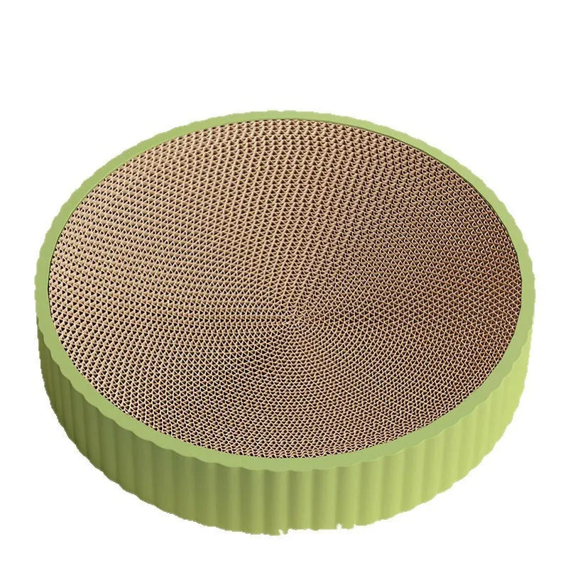 Green round cat scratching board made of corrugated cardboard, 55cm diameter.