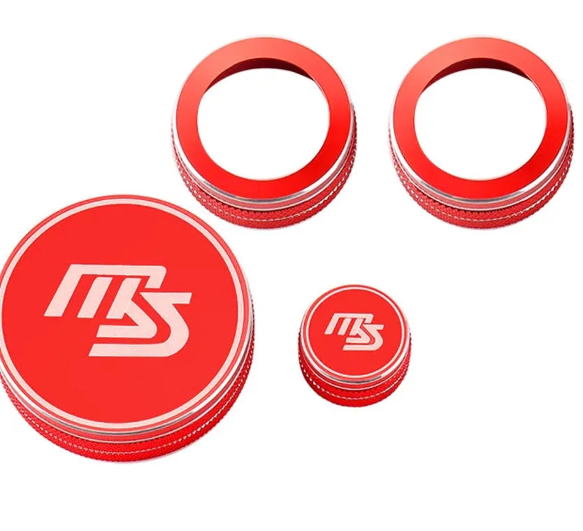 Red aluminium alloy decorative ring for car multimedia knob with MS logo on dashboard