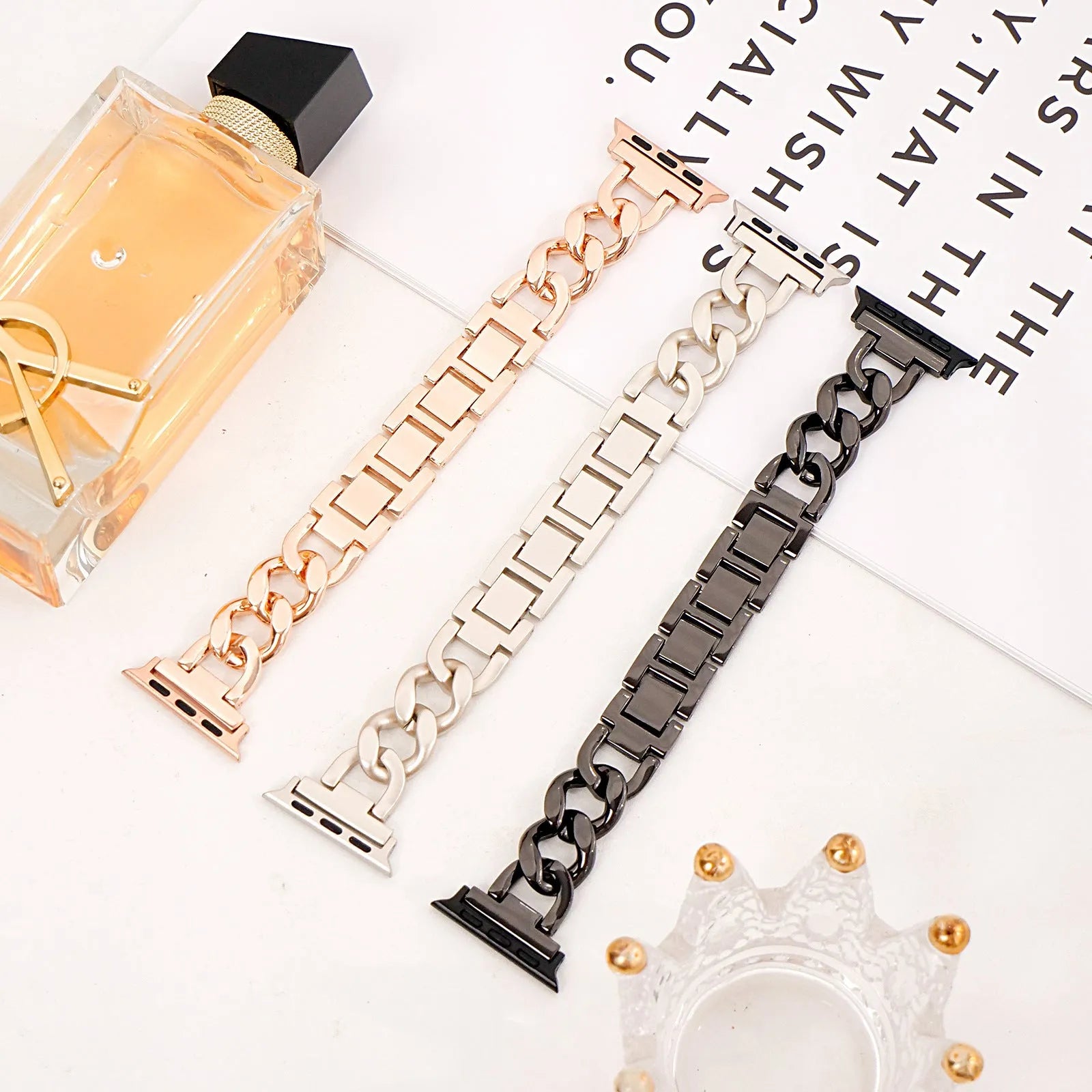 Metal denim chain Apple Watch strap in silver, black, gold, rose gold, and Starlight colours showing textured design