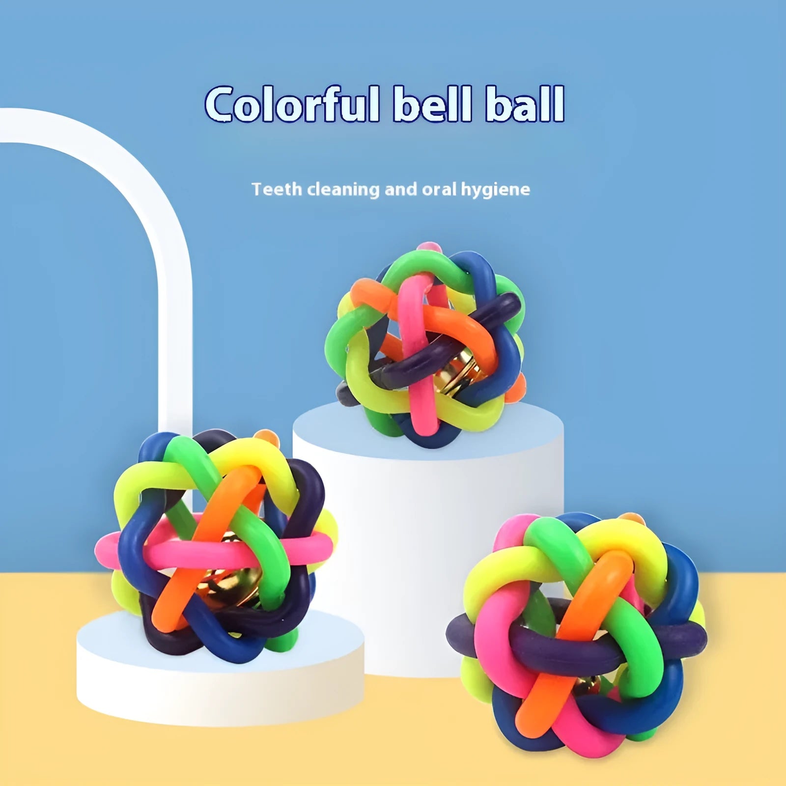 Colourful woven plastic pet toy ball with bell in rainbow colour on white background