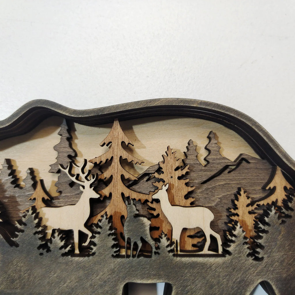 Boxwood elk ornament 18cm tall with antlers, natural wood finish, on a tabletop