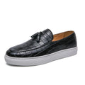 Men's brown artificial PU sneakers with a tassel detail and round toe on a rubber sole.
