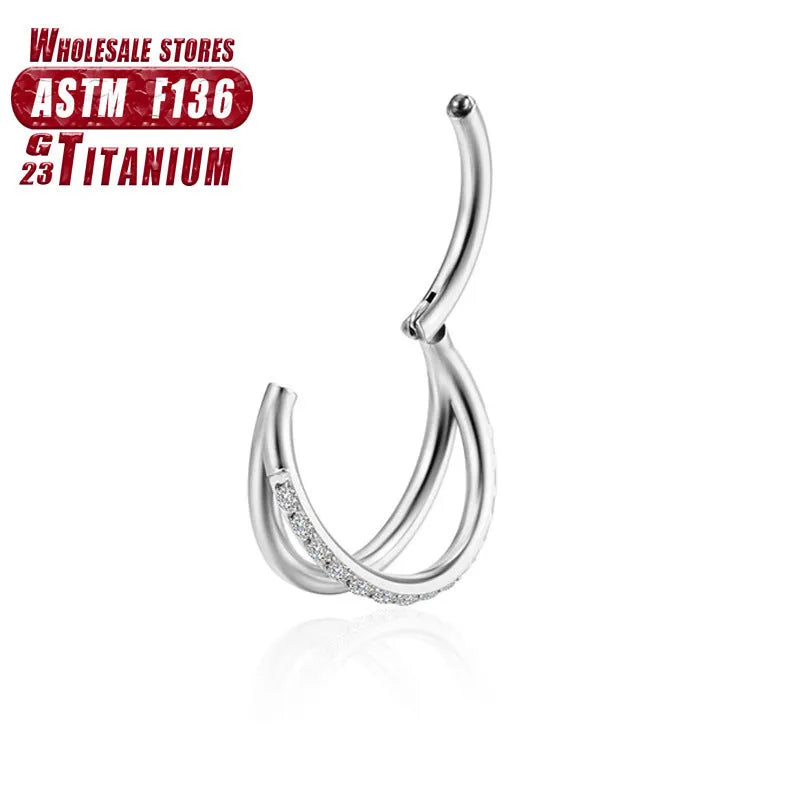 Close-up of a titanium alloy fork nose ring on a plain background, showing the straight post and bent back design.