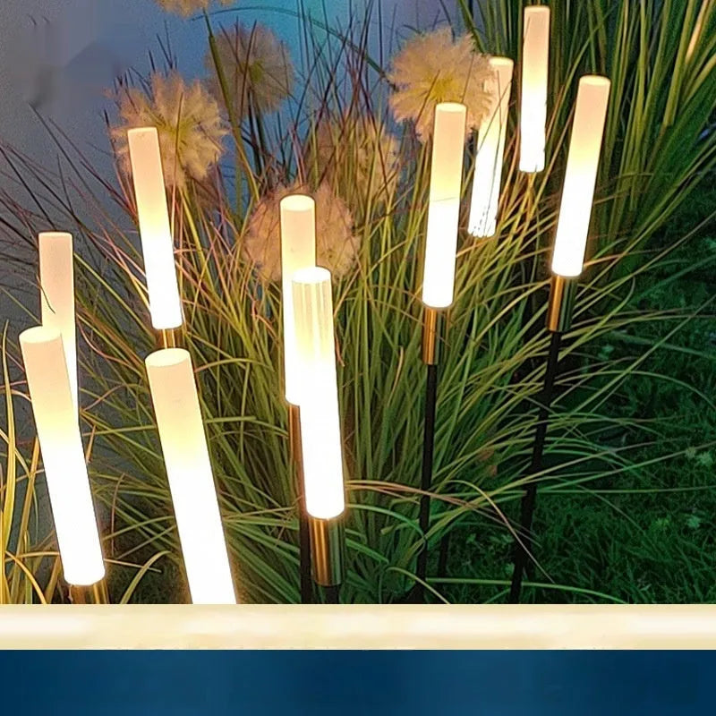 Solar outdoor LED plug lawn lamp with stainless steel wheat design in a garden setting, 1100mm height option