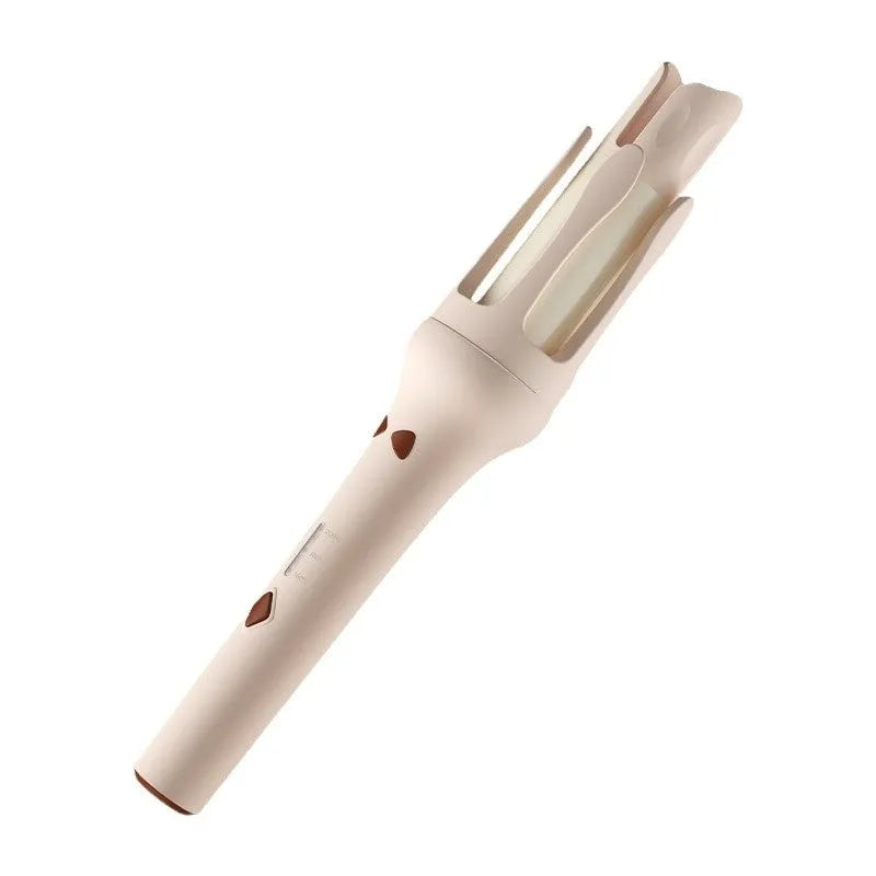 White and pink automatic hair curler with 32mm rotating barrel on a table