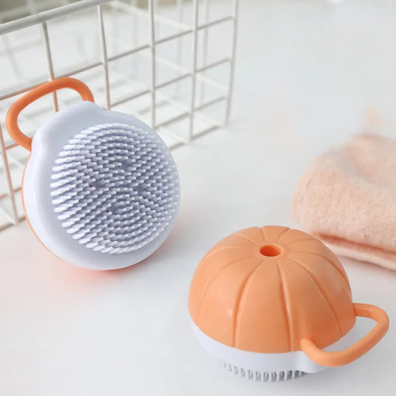 Orange TPR dog shampoo brush with silicone comb teeth and pumpkin-shaped ergonomic handle