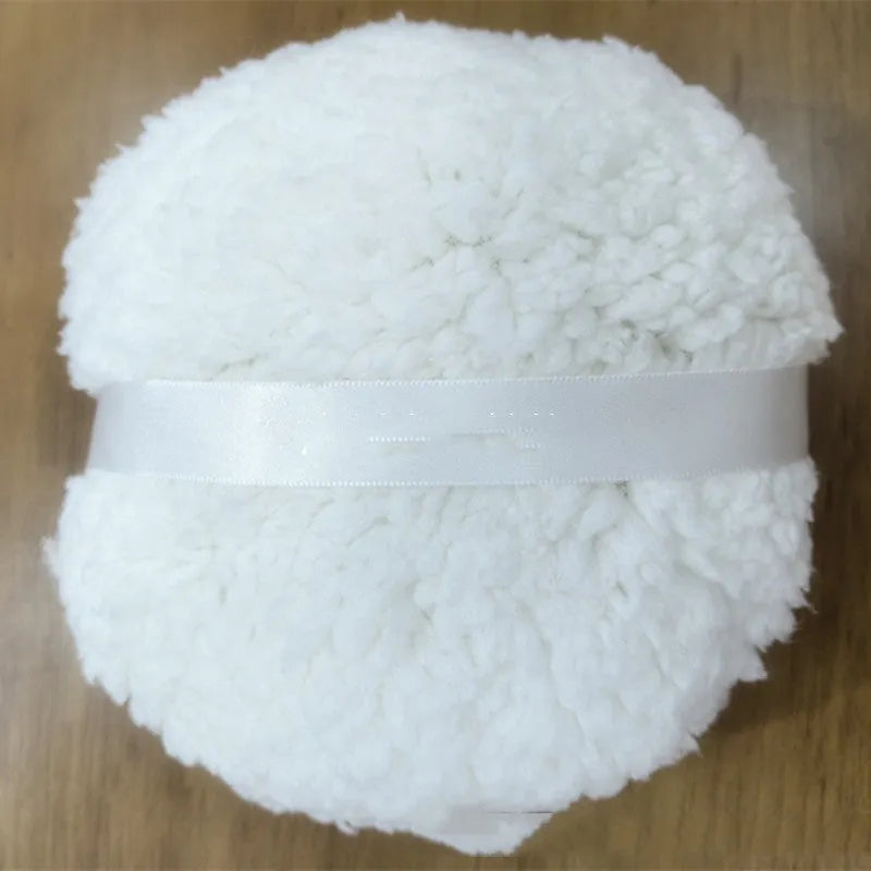 Oversized rectangular plush powder puff in white, skin colour, or pink for makeup application