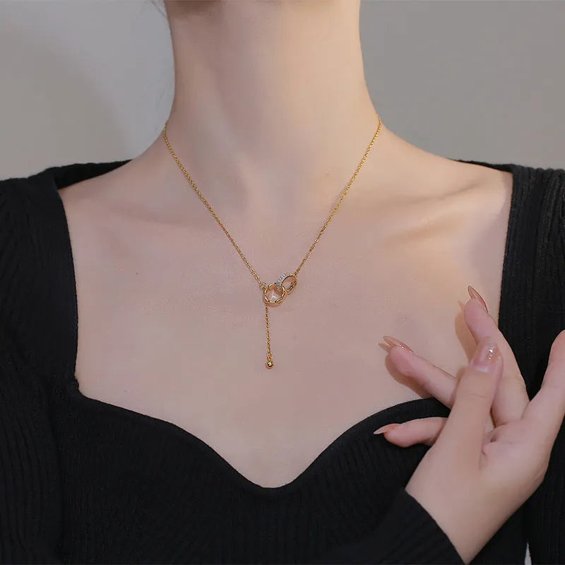 Titanium steel tassel clavicle chain necklace with double ring pendant in gold or silver finish