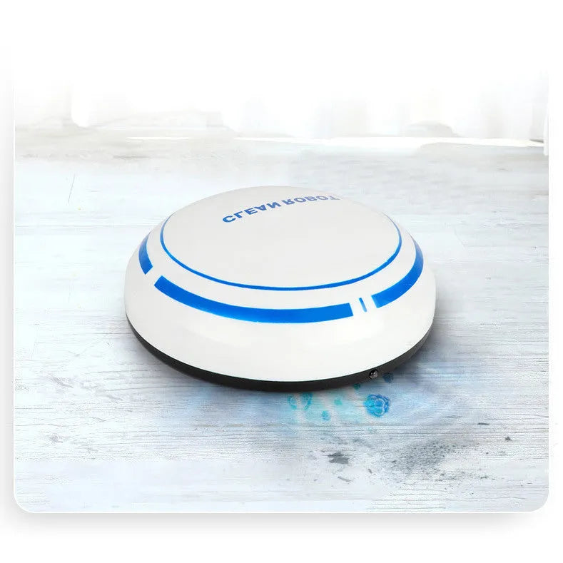 Mini desktop robot vacuum cleaner in white or black with dry dust box, flat nozzle and 4 metre power cord.