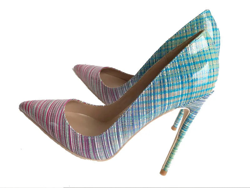 Pink and blue gradient patent leather ladies high heels with a pointed toe on a rubber sole.