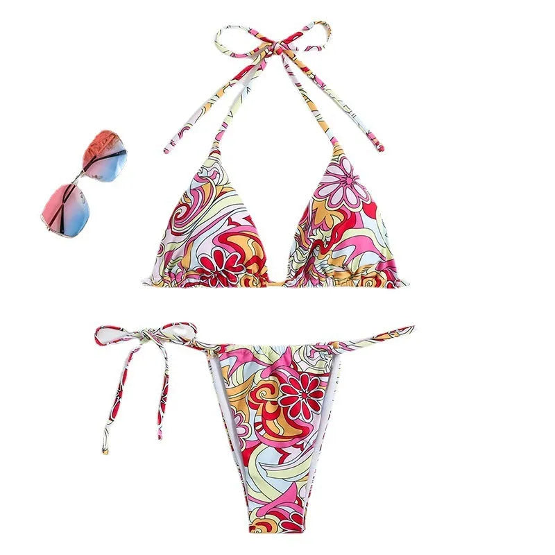 Women's triangle print bikini set with halter neck top and separate bottoms in multicolour pattern