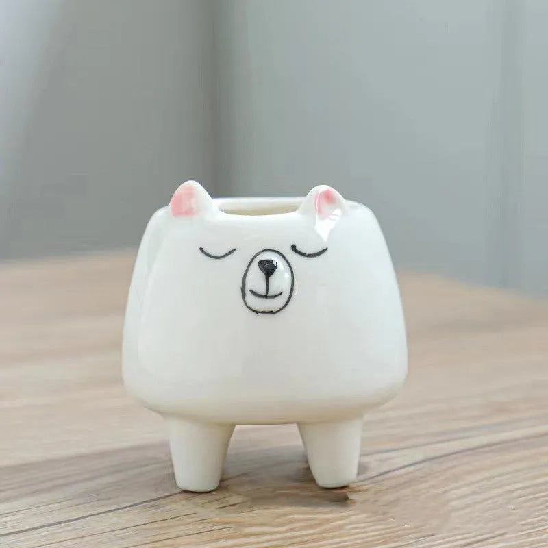 Hand painted ceramic succulent flowerpot with cartoon animal design in pastoral style.