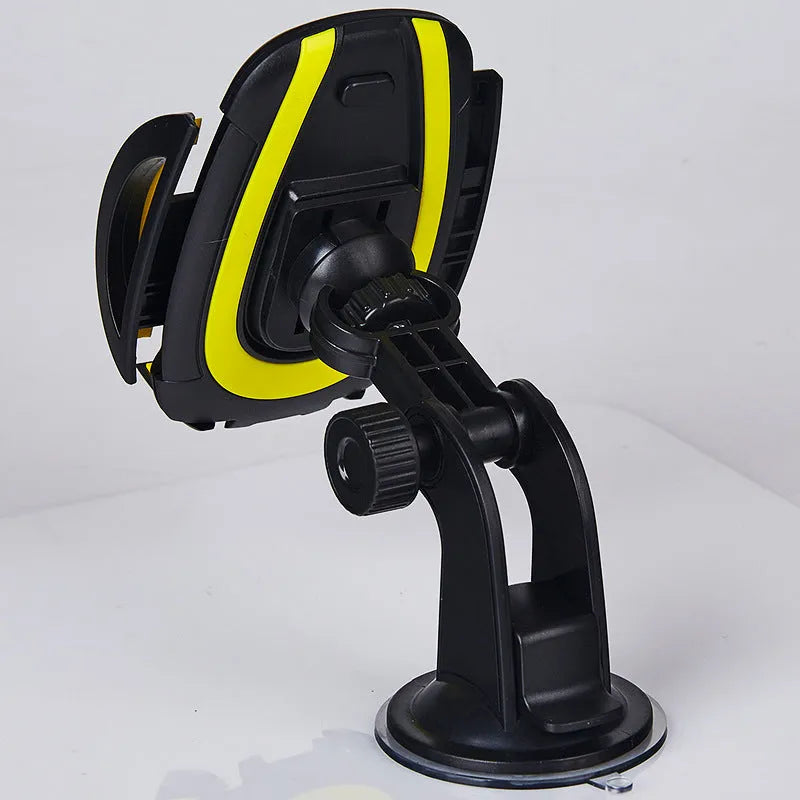Red ABS car phone holder with U-shaped bracket and suction cup mount on a dashboard.