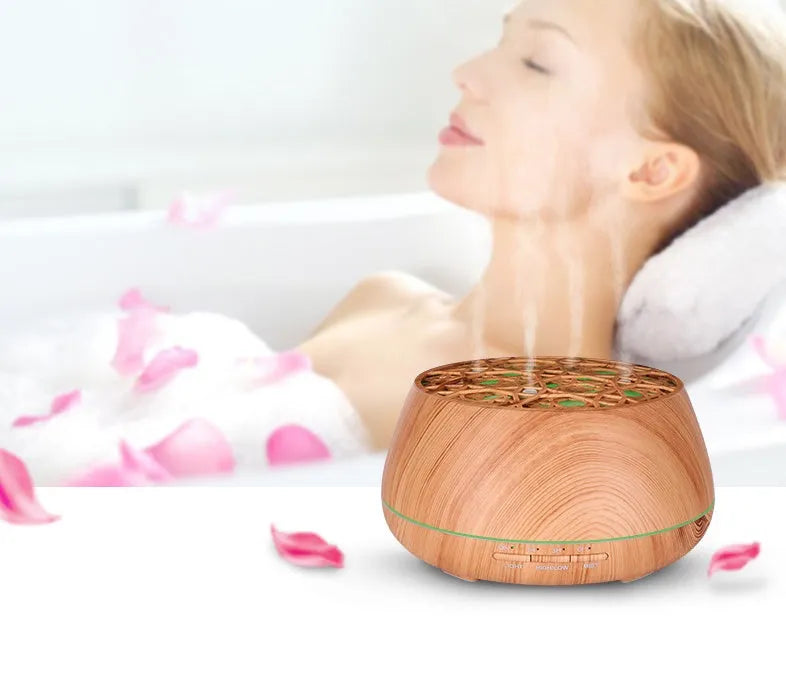 Four-hole misting ultrasonic aroma diffuser in dark wood grain finish with 400ml capacity and control buttons