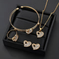 Women's gold tone alloy jewelry set with matching earrings, pendant and bracelet featuring love patterns