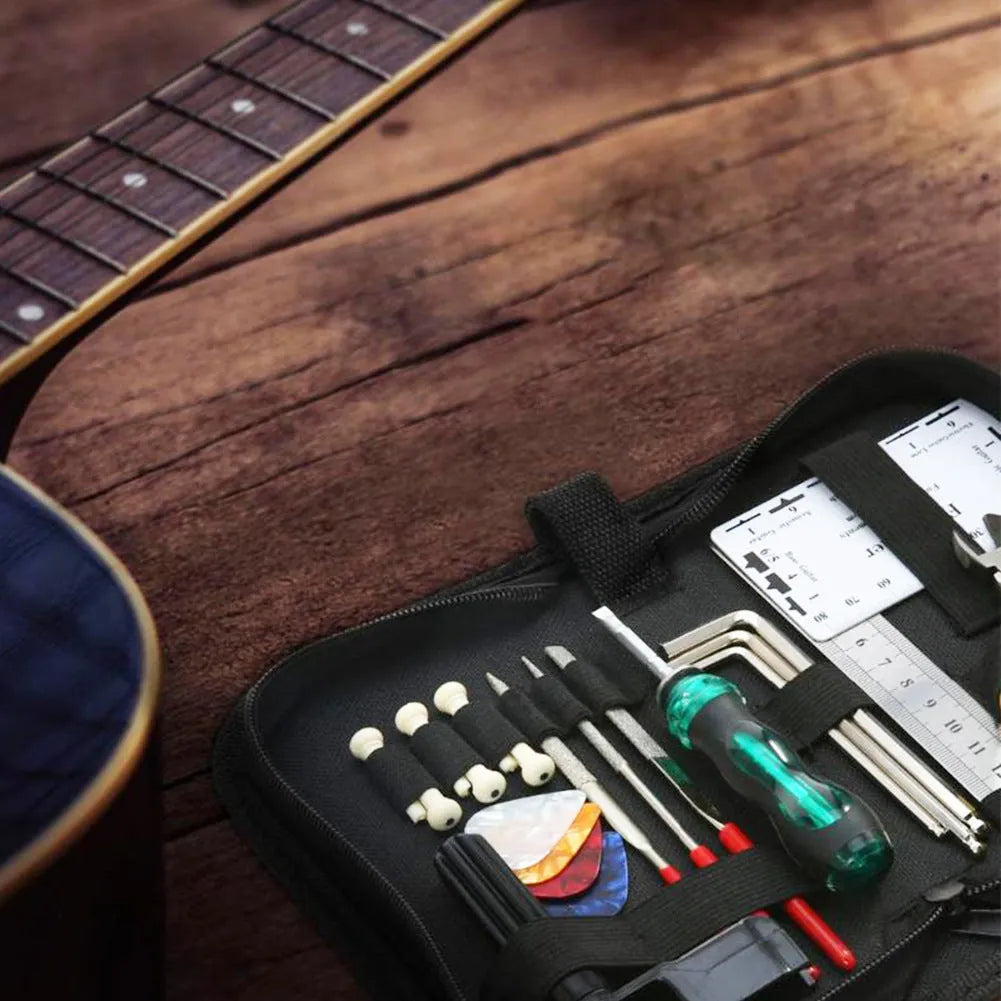 Black plastic case open to reveal 12 metal guitar repair tools including hex keys and screwdrivers