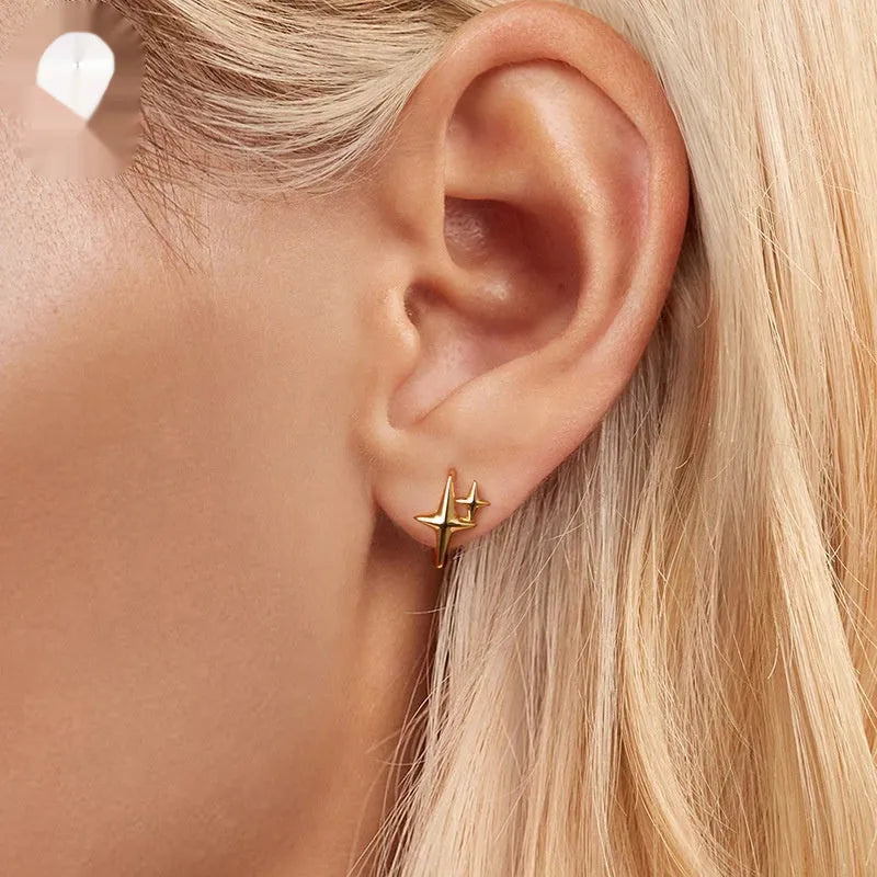 Sterling silver star ear clips with oxidised antique finish, small stud design for pierced ears