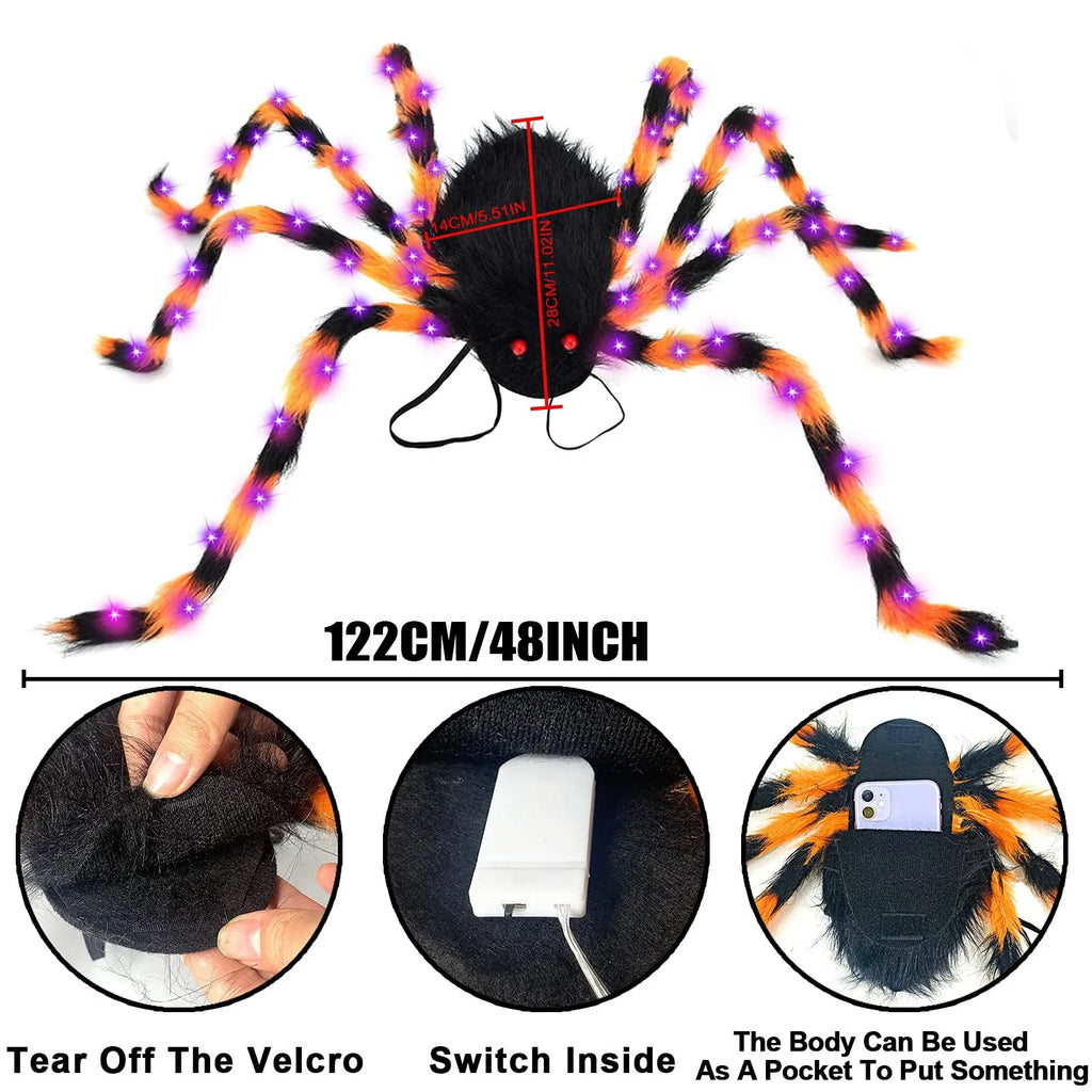 Orange Halloween spider backpack with purple LED lights on plush sugar bag material.