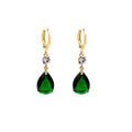 Pair of green geometric teardrop-shaped alloy earrings on a white background.