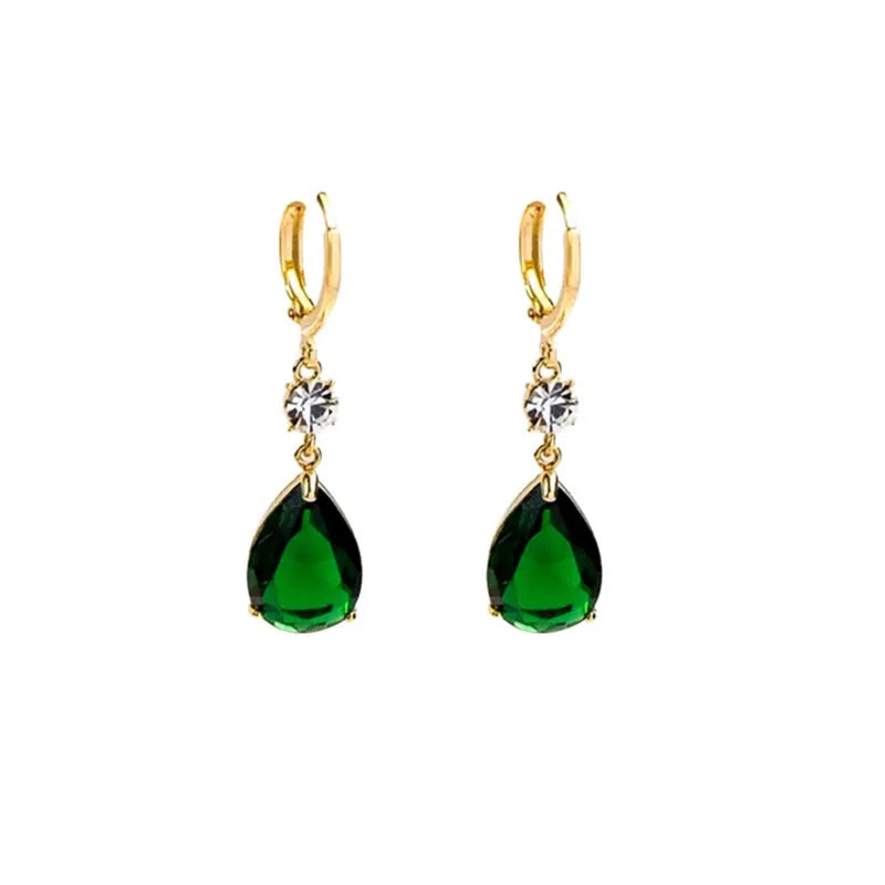 Pair of green geometric teardrop-shaped alloy earrings on a white background.