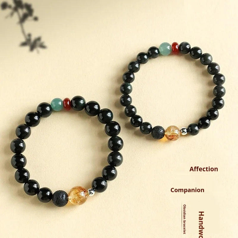 Chinese-style natural stone couple bracelet with obsidian, yellow tower crystal, agate, and jade beads.