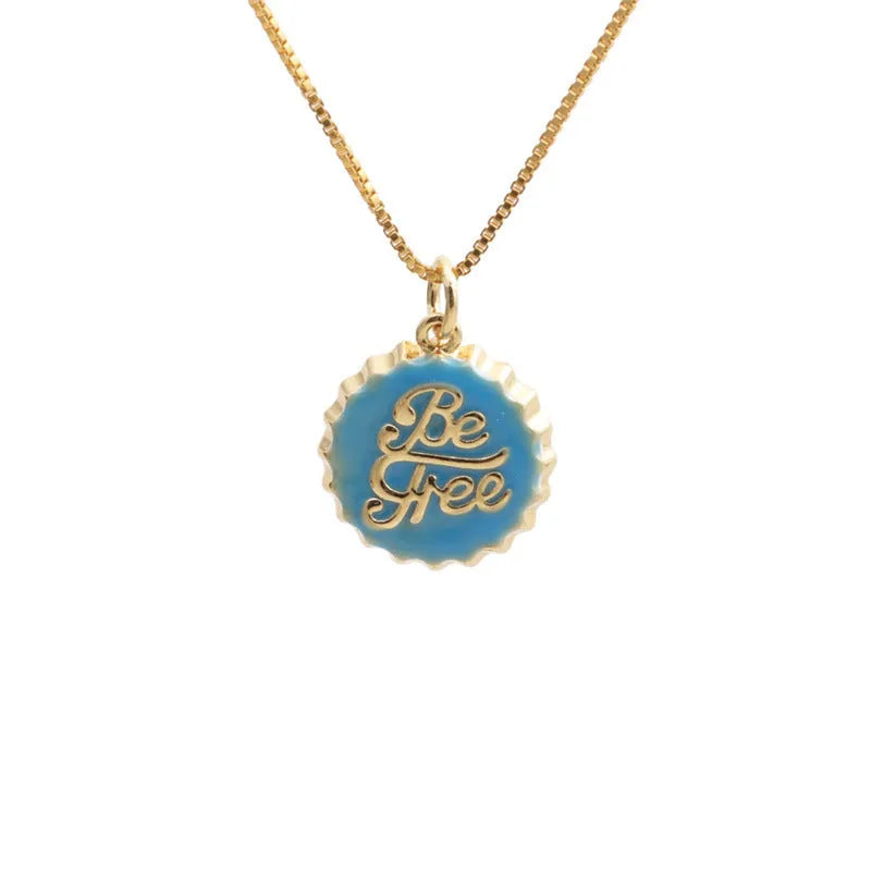 Gold plated copper bottle cap pendant necklace on a 40cm box chain.