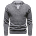 American retro fake two-piece V-neck dotted sweater in black with batwing sleeves on model