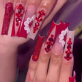 Sweet floral pattern fake nails with red diamond accents in European square long shape