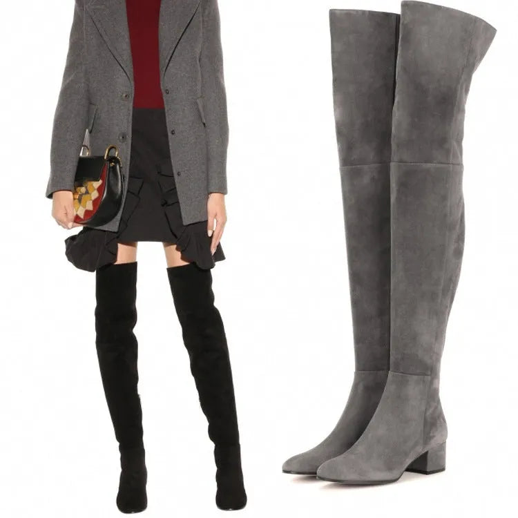 Grey suede women's over-the-knee flat boots with pointed toe and low thick heel.