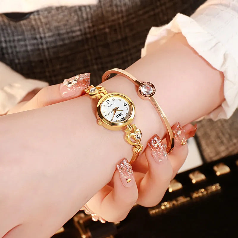 Women's simple rhinestone casual square watch with gold alloy strap and stainless steel buckle on white background