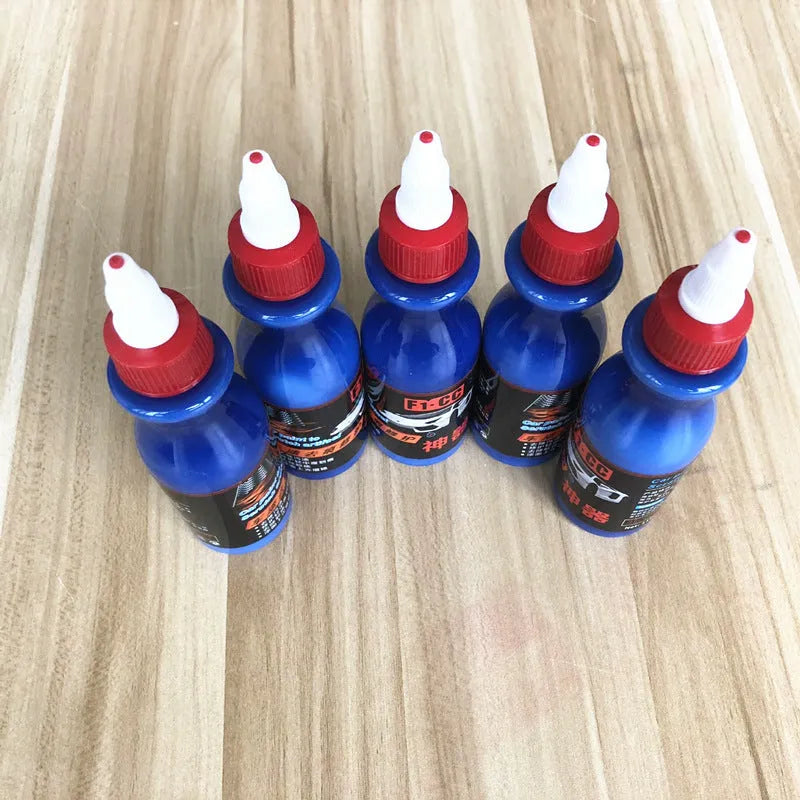 Small blue car wiping tool and scratch repair agent for automotive paint touch-ups
