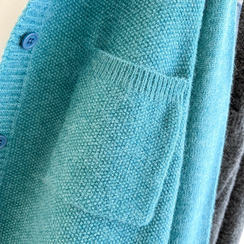 Solid colour round neck acrylic cardigan jacket for women sky blue loose fit princess sleeves
