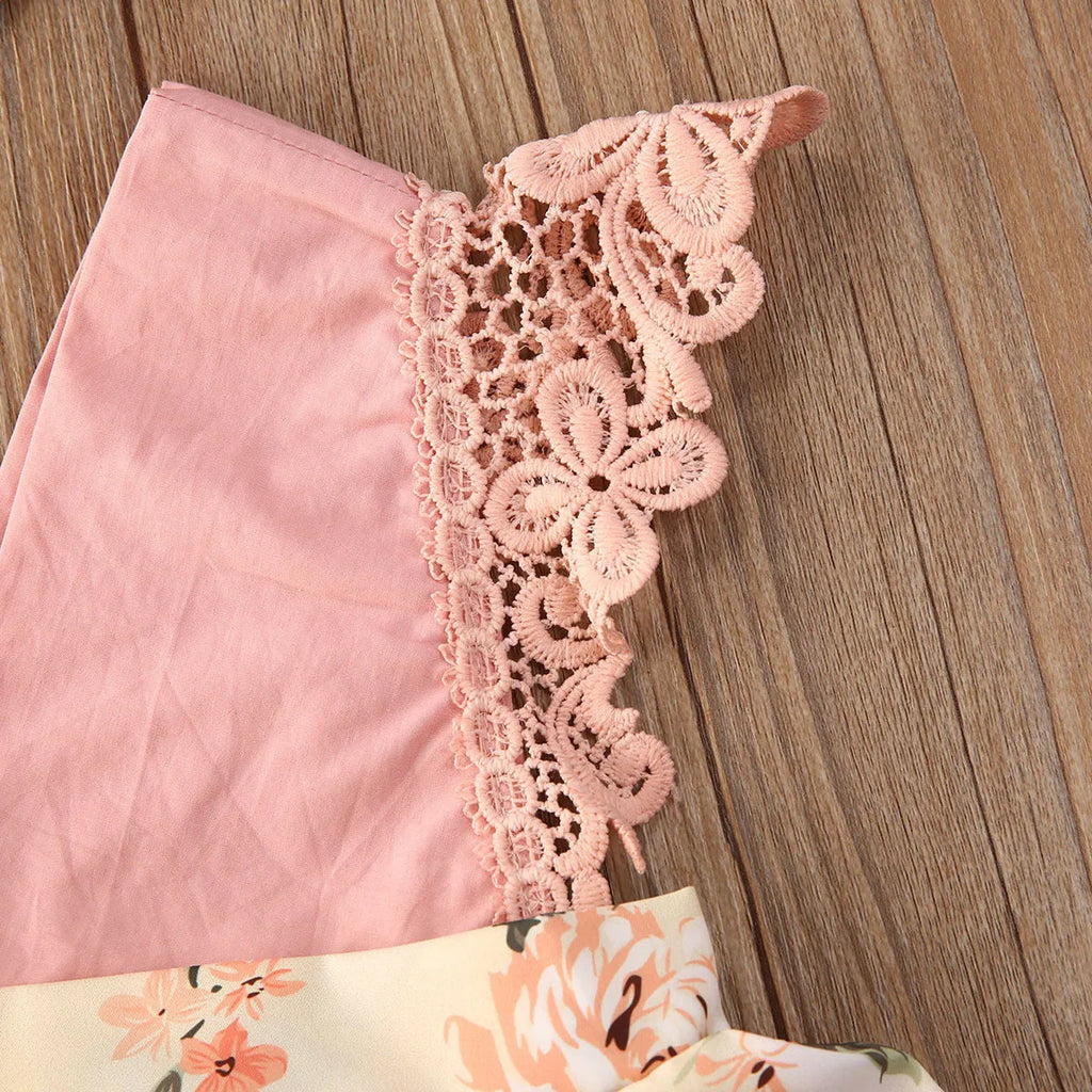 Baby girl pink floral lace V neck sleeveless jumpsuit with matching headband on white background