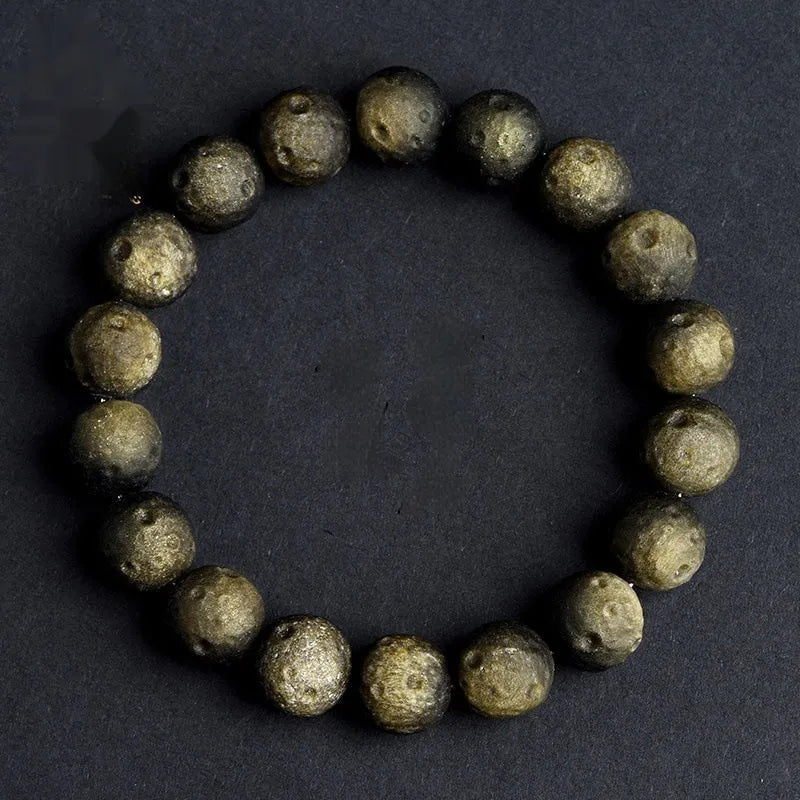 Natural crater ball obsidian bracelet with grinding texture in gold or silver meteorite tones
