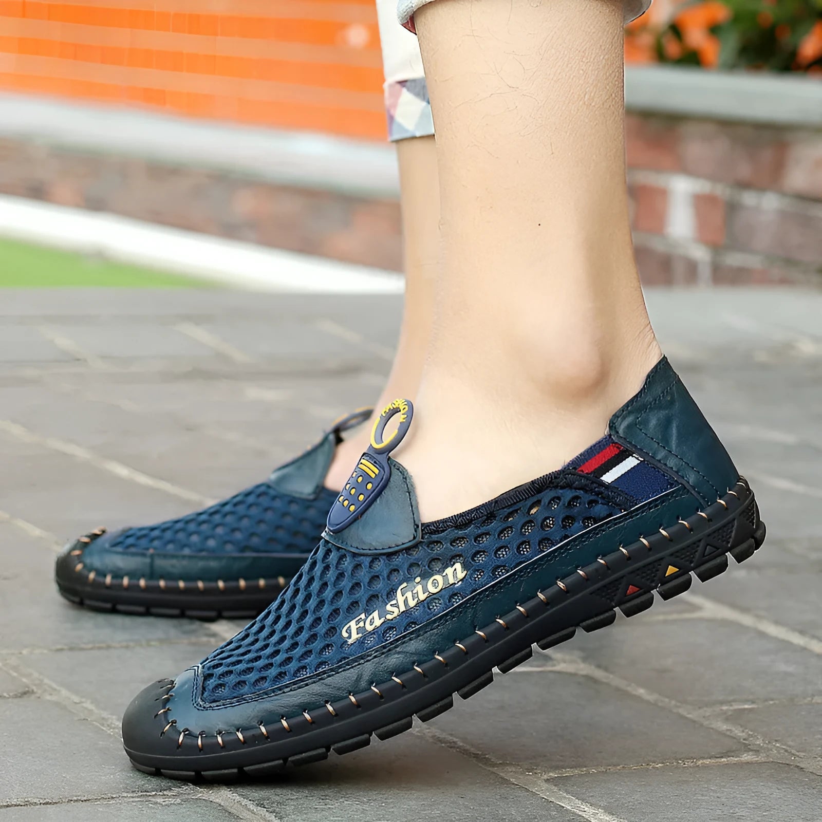 Men's brown breathable mesh casual shoes with round toe and rubber sole.