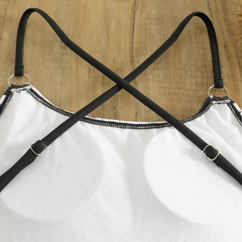 Women's one-piece swimsuit with black and white skeleton print, polyester lining, sizes S to XL.