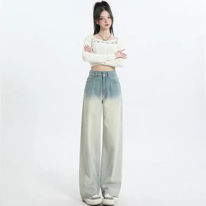 Women's gradient blue straight-leg wide-leg denim trousers laid flat.
