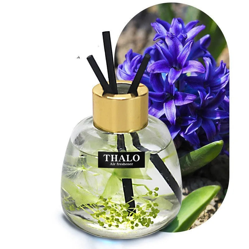 Glass bottle car perfume ornament for vehicle aromatherapy in decorative design.
