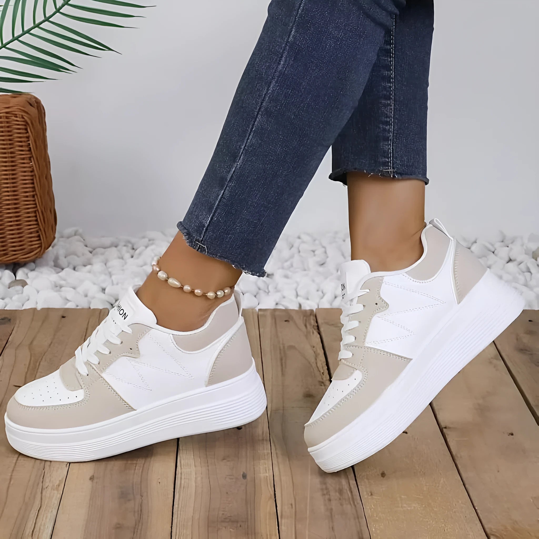 Children's low-top lace-up sneakers in white with canvas upper and thick sole, side view