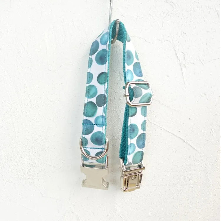 Blue bohemian polyester dog collar with adjustable sizing on a white background