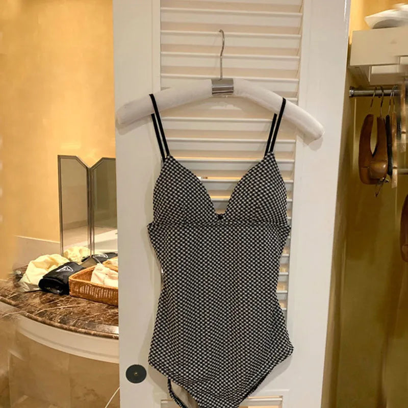 Blue one-piece cover belly swimsuit on a mannequin, designed for a small chest fit.