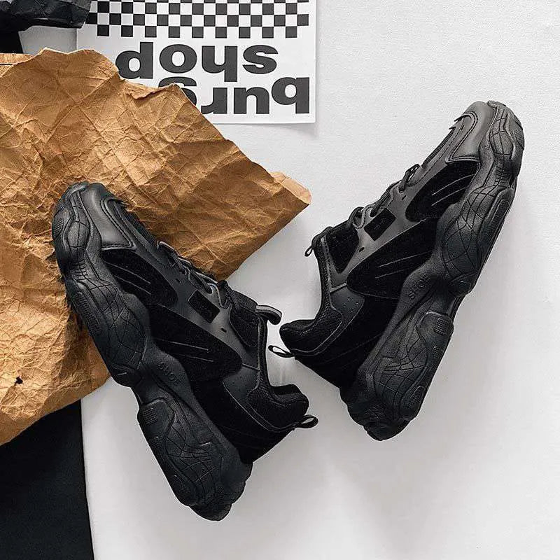 All-black platform running sneakers for men with PU upper and rubber sole, round toe design