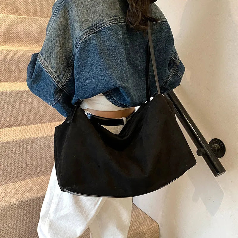 Women's large capacity suede pillow shoulder bag in PU leather, black colour, with outer slit pocket