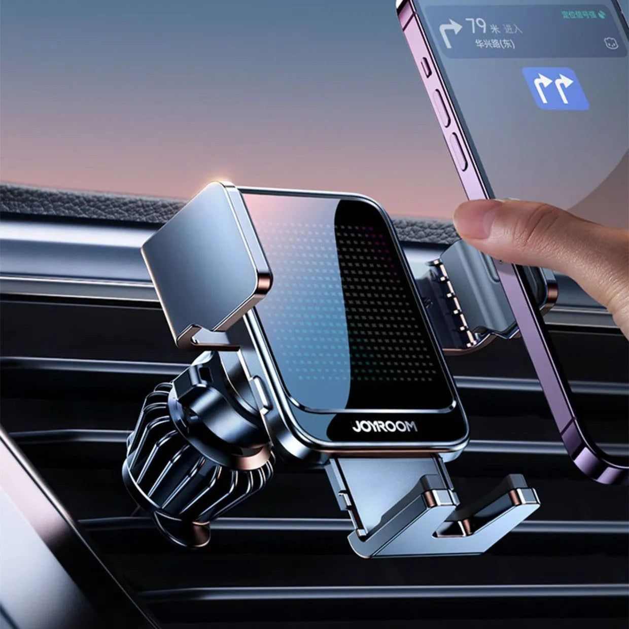 Black car wireless charging bracket mounted on an air vent, holding a mobile phone.