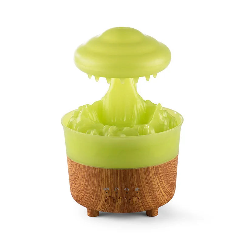 Wood grain white column-shaped rain cloud humidifier diffuser with LED night light on a table.
