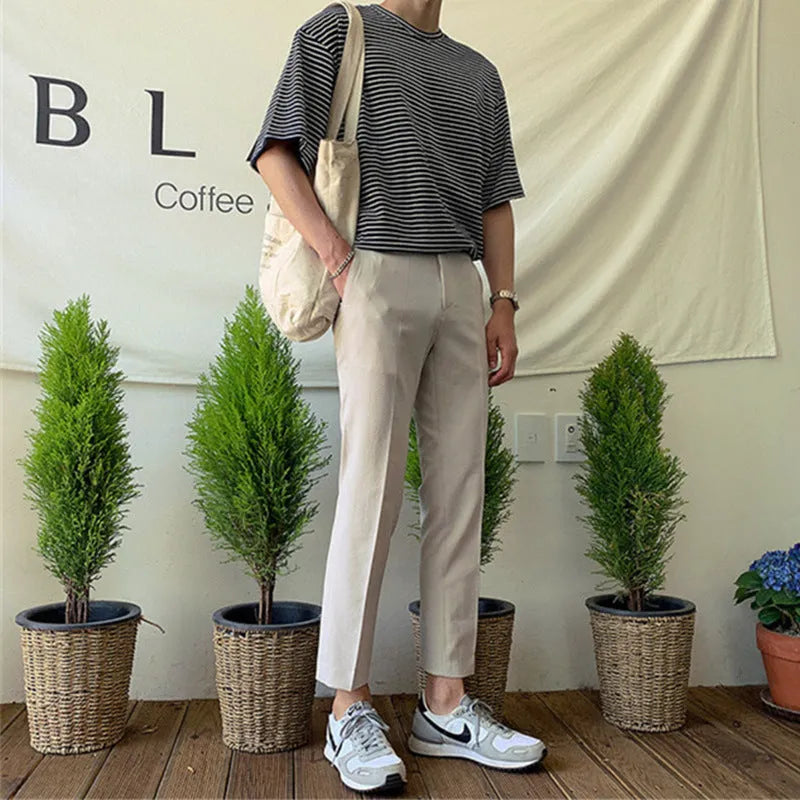 Men's straight-leg cotton trousers with drawstring waist in black, grey and khaki colours