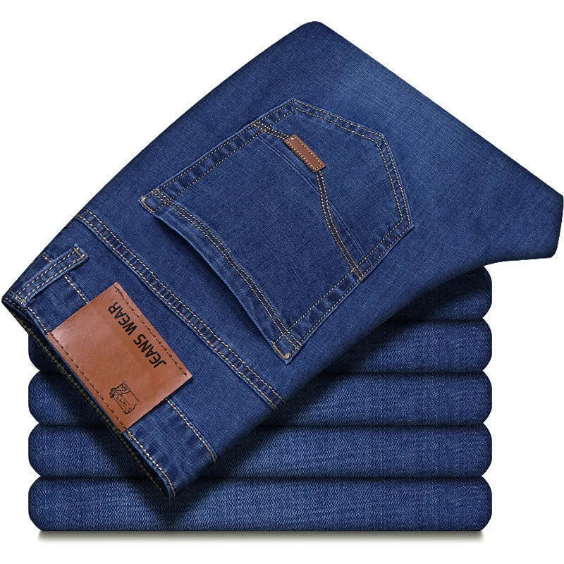 Men's loose straight casual work stretch jeans in blue elastic option with mid-waist and straight leg