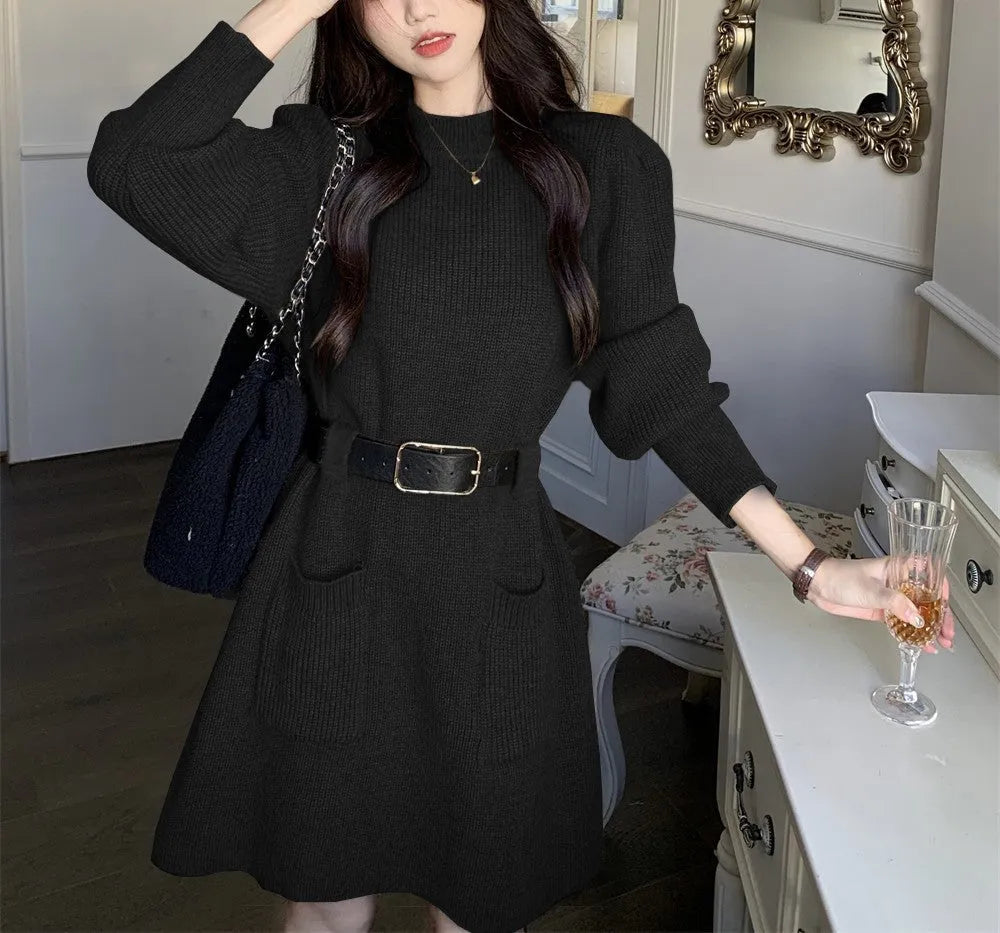 Women's loose knitted dress with long sleeves and high waist, shown in beige with black belt