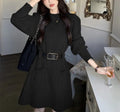 Women's loose knitted dress with long sleeves and high waist, shown in beige with black belt